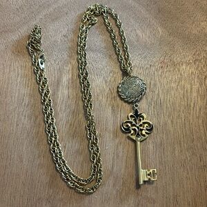 Gorgeous 36” chain with a gold and black enamel antique key pendant necklace
